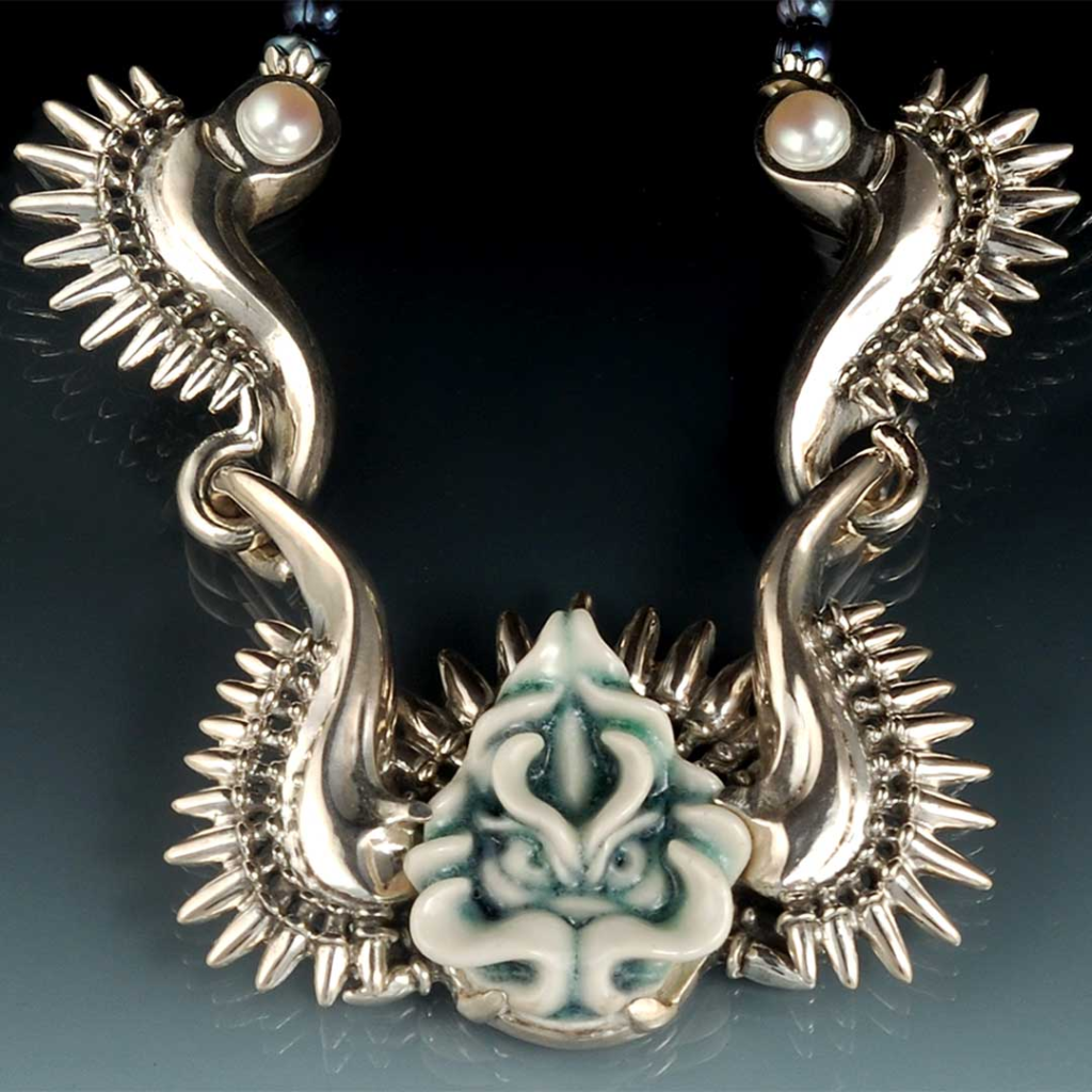 Dragon Necklace – Handcrafted Fantasy Jewelry Explore handcrafted dragon art jewelry including necklaces, rings, and pendants.